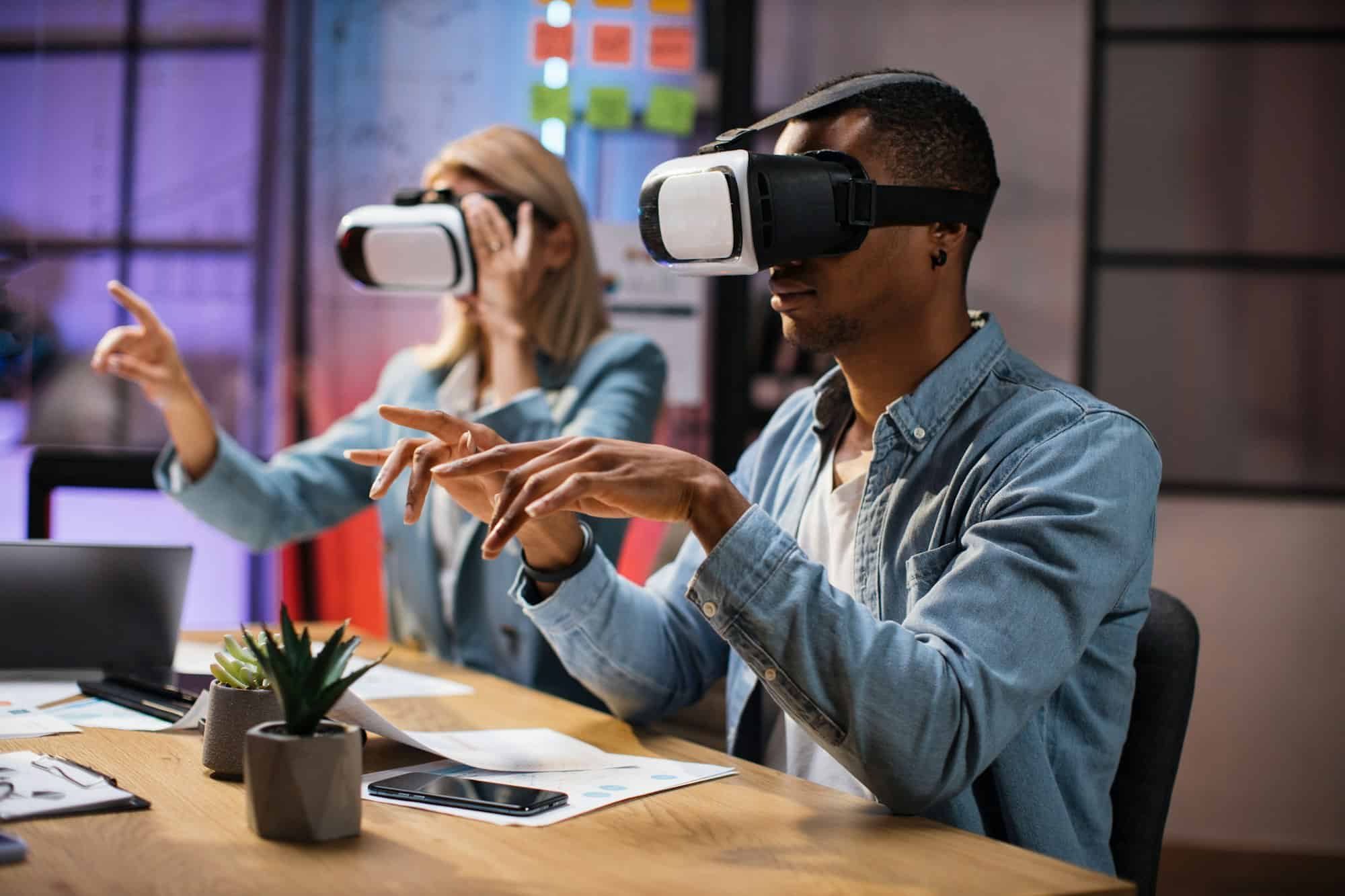 company workers wearing vr headset during meeting.jpg